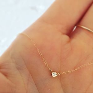 14KT GOLD SOLO DIAMOND PENDANT